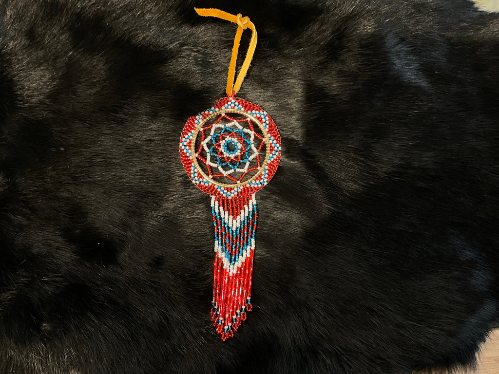 blue, red, and white beaded dream catcher