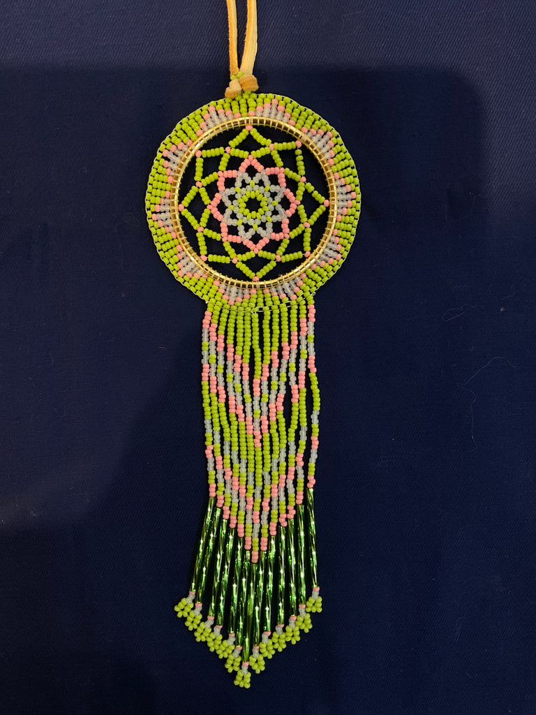 green and pink beaded Dream weaver