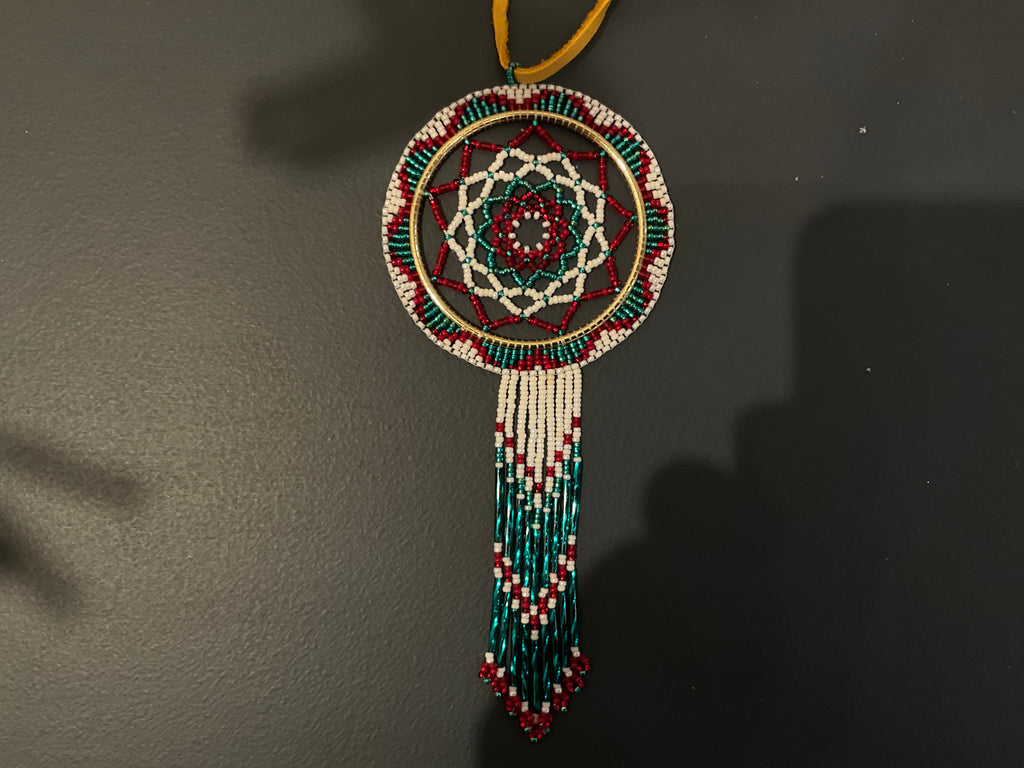 Green, white, red beaded Dream weaver