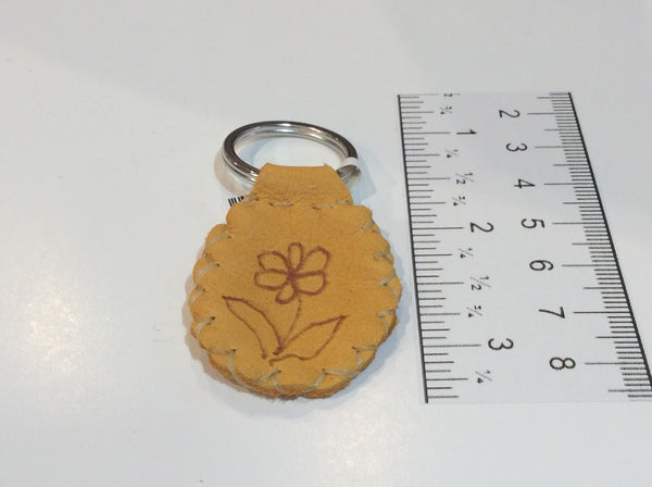 Burned design on leather keychain